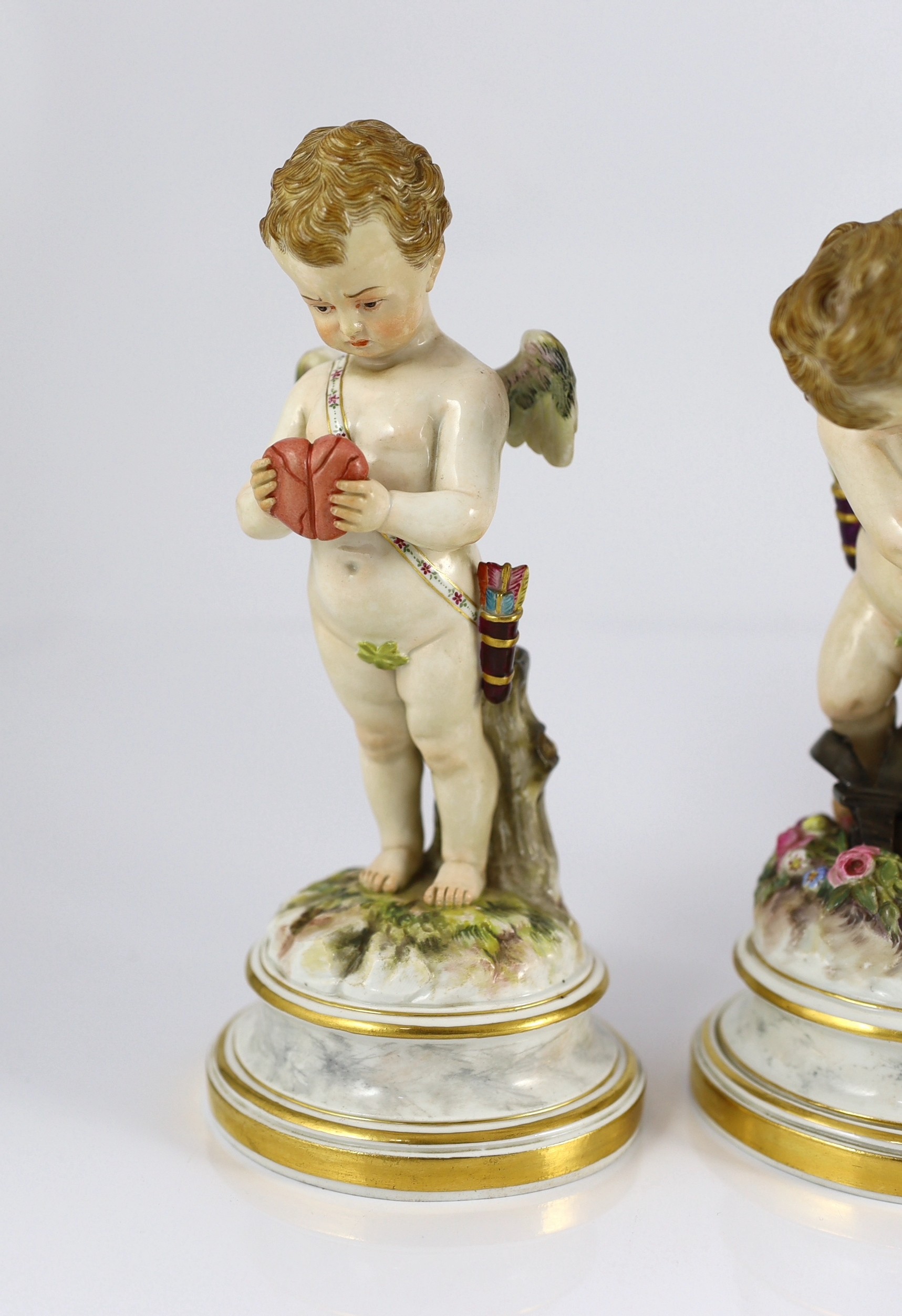 A series of five Meissen porcelain figures of Cupid, late 19th century, modelled by Heinrich Schwabe, 15.5cm - 20cm high, perplexed Cupid restored, Provenance - purchased from Winifred Williams, Eastbourne/London before